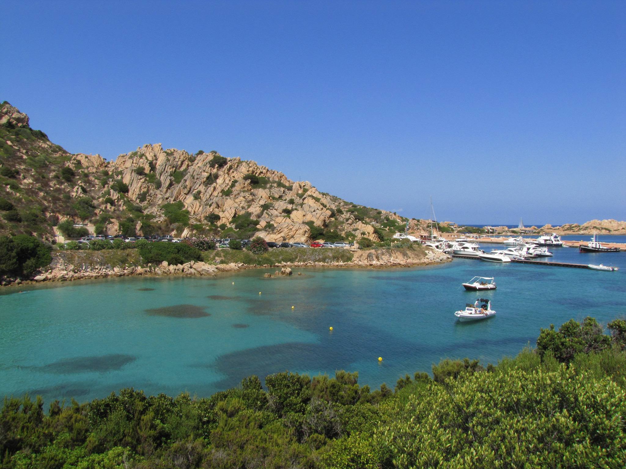A bay on La Maddalena with boats at anchor